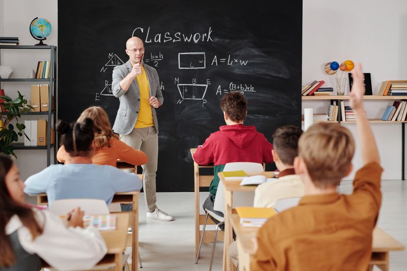Junior high students learning in class