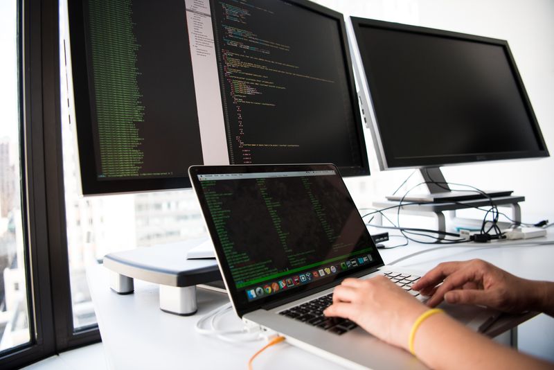Tertiary student focused on laptop projects